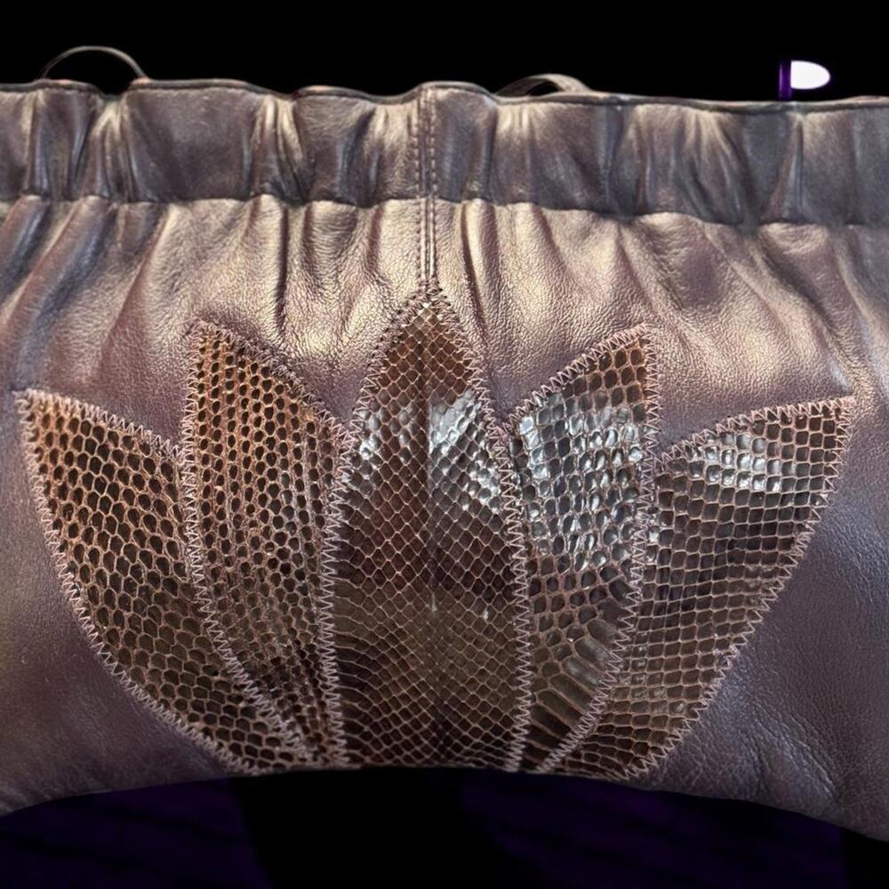 1980's vintage leather purse with reptile pattern accents.